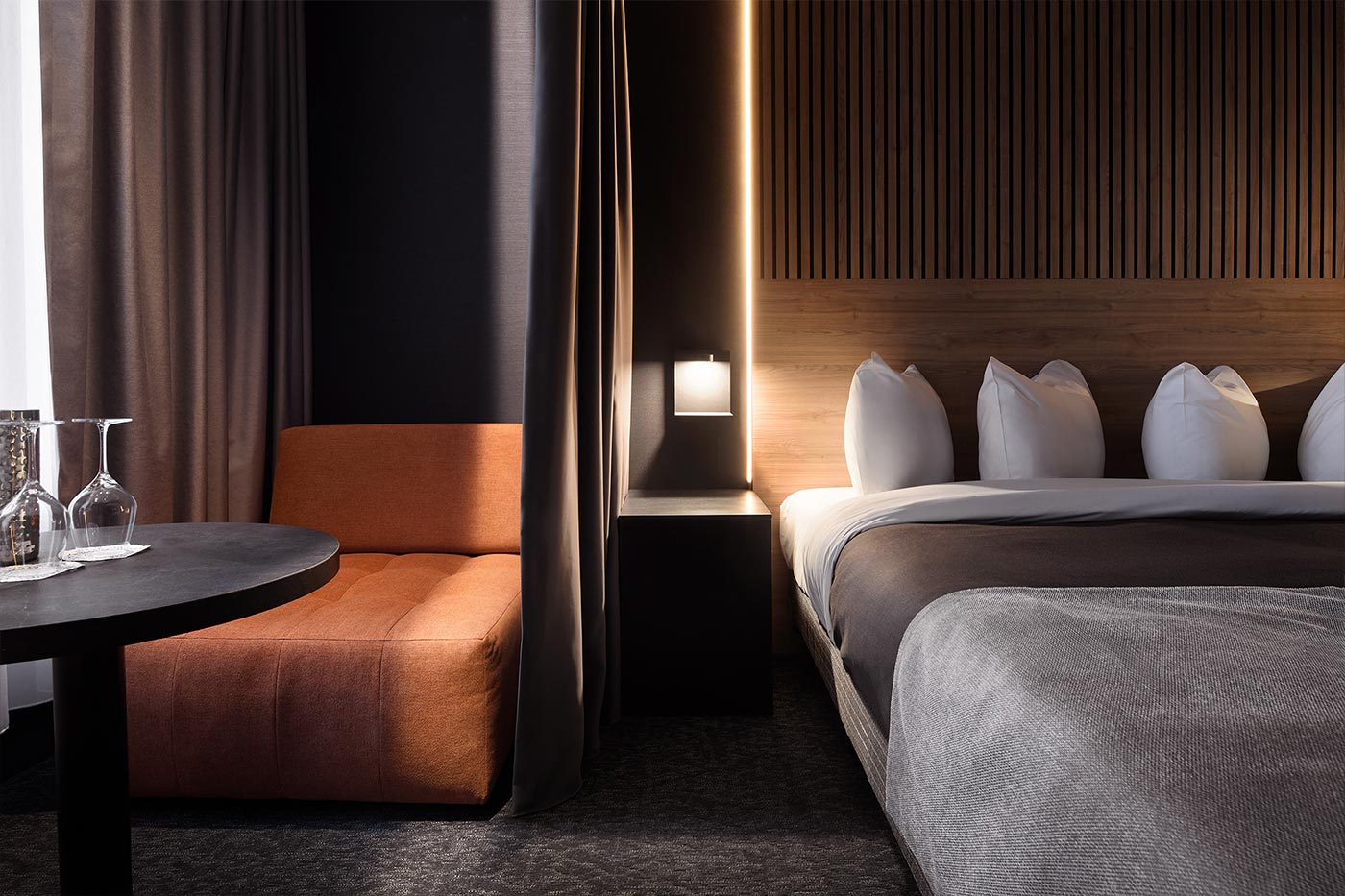 SonoLux hotel room, multifunctional spaces with dividable black out curtain