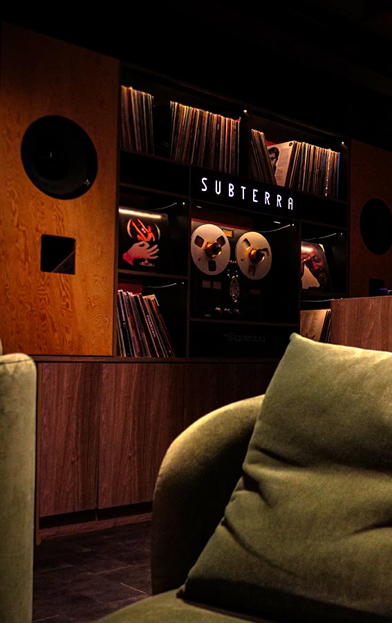 Subterra audio wall with Altec speakers and Technics reel to reel and Tom Noble vinyl