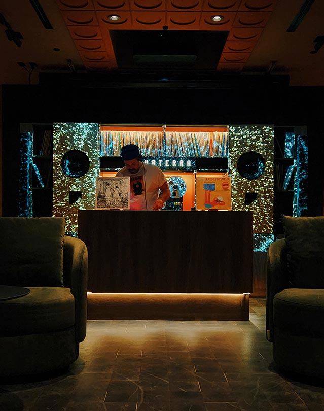 Chris B De Muri vinyl selector on the Dj booth at Subterra